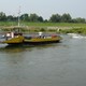 Richard van Oijen op zijn voetveer WUTA. © Onbekend, alle rechten voorbehouden.